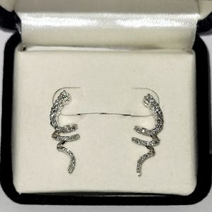 14k white gold 1/2 carat twisted diamond earrings